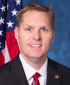 Official portrait of Michael Guest