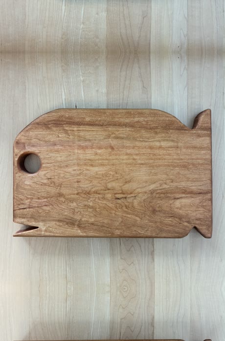 Something's Fishy — cherry wood cutting board shaped like a fish
