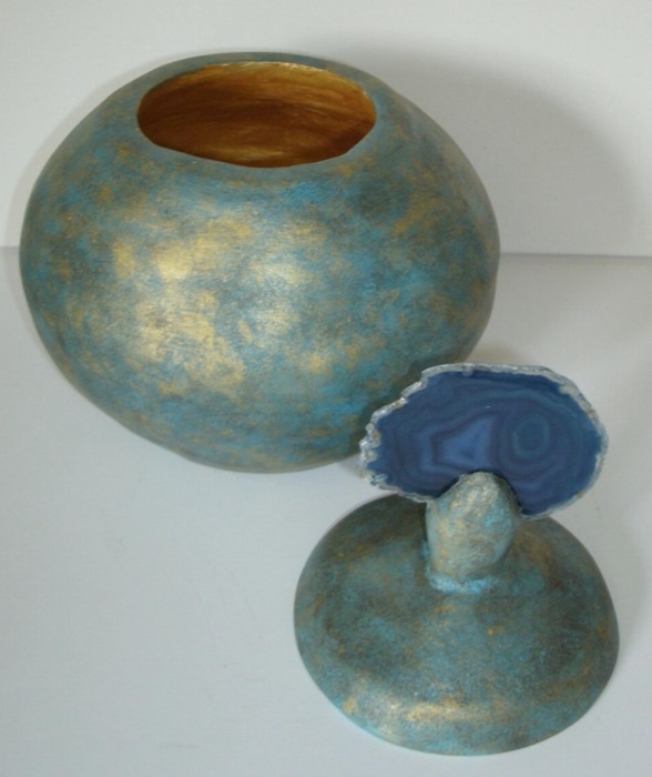Watching Eye — hand-spun ceramic vessel with a stone resting on top